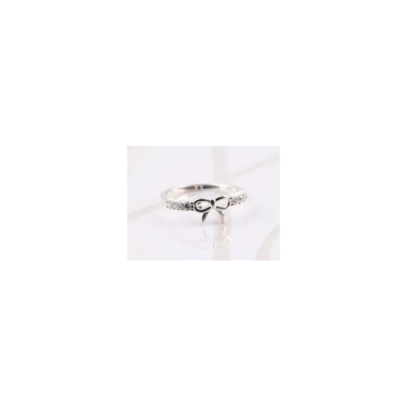 ANILLO PLATA SILUETA MOÑO ZIRCONIA