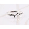 ANILLO PLATA SILUETA MOÑO ZIRCONIA