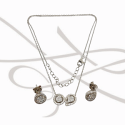 JUEGO PLATA RODIZADA CIRCULAR Y GOTA TOPACIO BLANCO