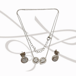 JUEGO PLATA RODIZADA CIRCULAR Y GOTA TOPACIO BLANCO