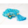 PULSERA CON DIJE ORO LAMINADO BARRO POMPON CRISTAL