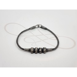 PULSERA CUATRO BOLAS PLATA PAVONADA