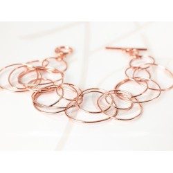PULSERA SIN DIJE RECUBRIMIENTO DE ORO ROSA AROS ENTRELAZADOS LISO